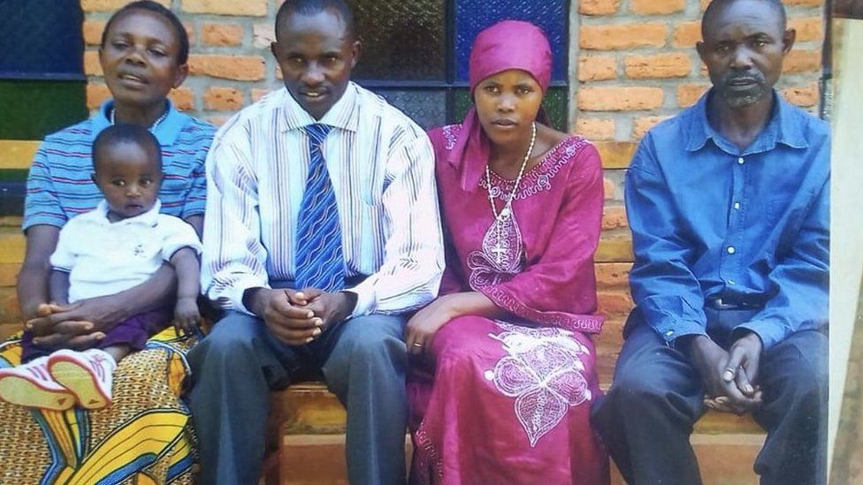 The happy couple flanked by Bernadette (L), holding their son, and Gratien (R)