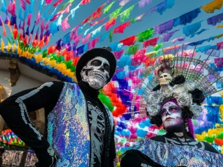 A young woman, dressed as La Catrina, and a young man, dressed as Catrin, particpate in the Day of the Dead festivities on October 31, 2022 in Jalisco, Mexico.