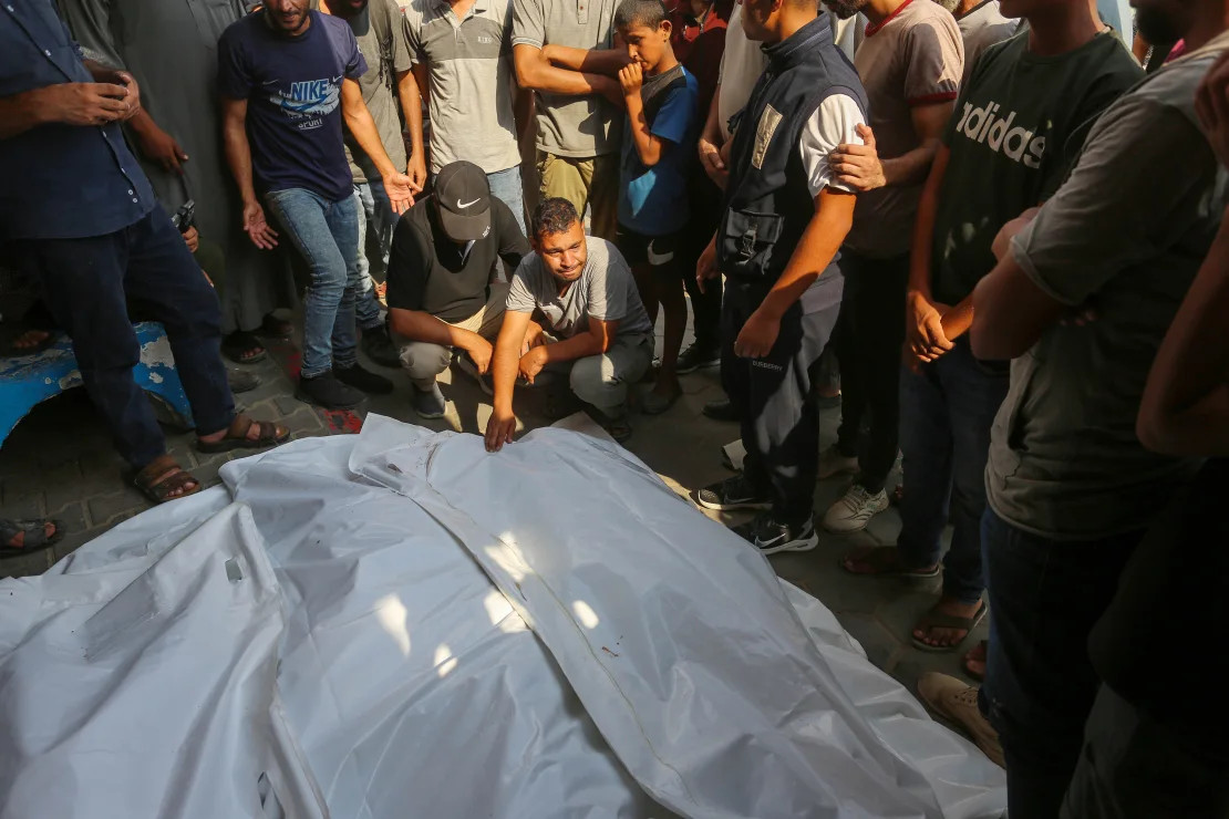 Bodies of Palestinian, including children, are brought to al-Aqsa Martyrs Hospital after Israeli attack on Al-Qashtat family house in Deir al-Balah, Gaza.