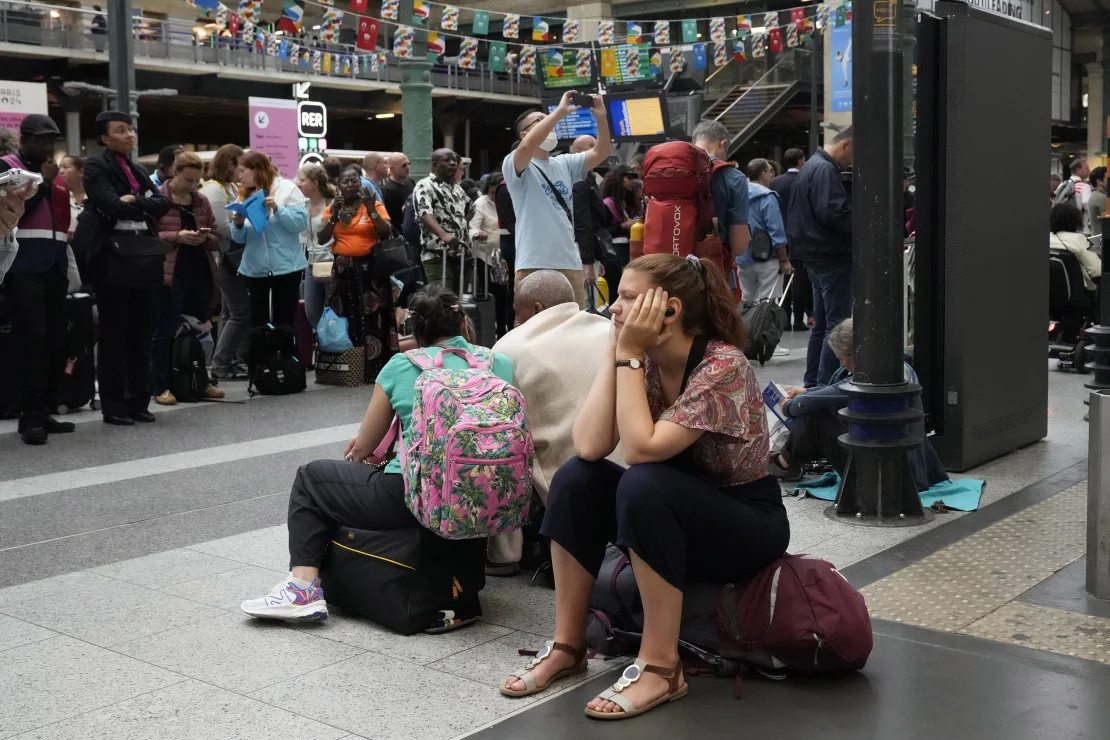 Paris's Gare du Nord train station hosts waiting travelers on.
