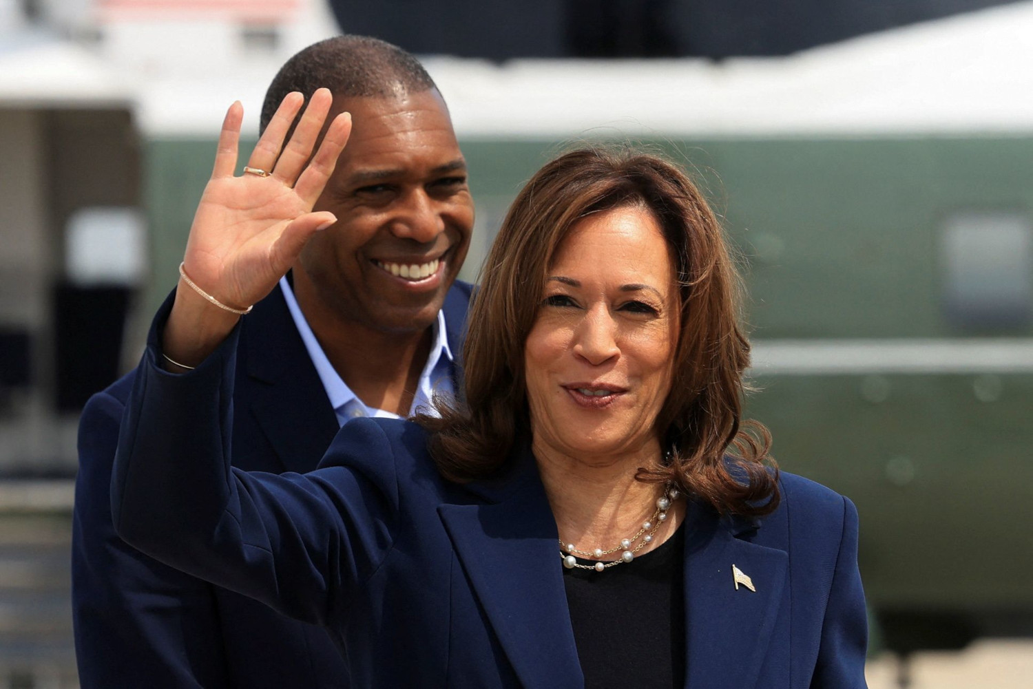 Vice President Kamala Harris bids farewell with a wave as she boards Air Force Two, en route to the campaign trail in Milwaukee. The departure took place at Andrews Air Force Base in Maryland.