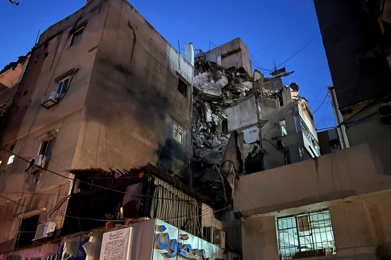 Damaged building after airstrike targeting Hezbollah commander