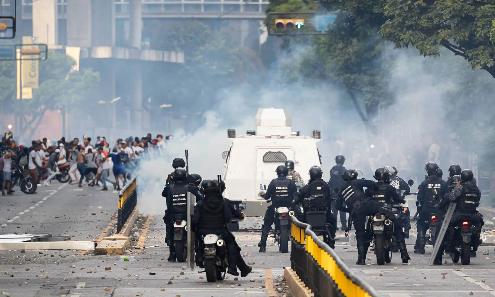 **Security Forces Clash with Opposition Protesters in Caracas Over Presidential Election Results** Members of the Bolivarian National Police and the Bolivarian National Guard engaged in confrontations with opposition demonstrators during protests against the presidential election results in Caracas, Venezuela, on Monday.