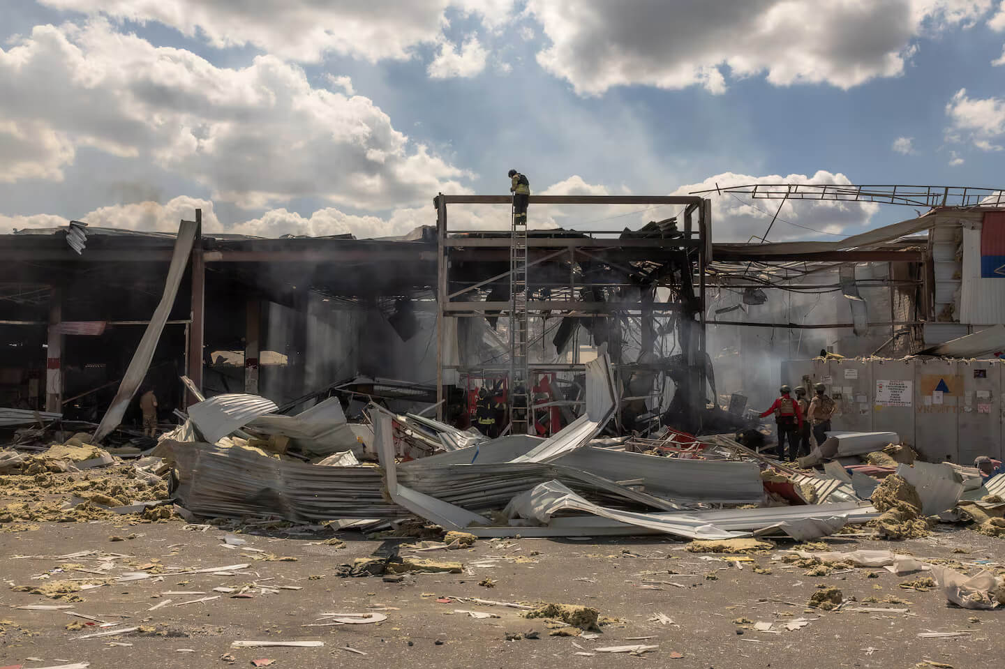 Ukrainian emergency services and rescue workers respond to the site of a destroyed supermarket following a Russian attack in Kostyantynivka, eastern Donetsk region, on Friday.