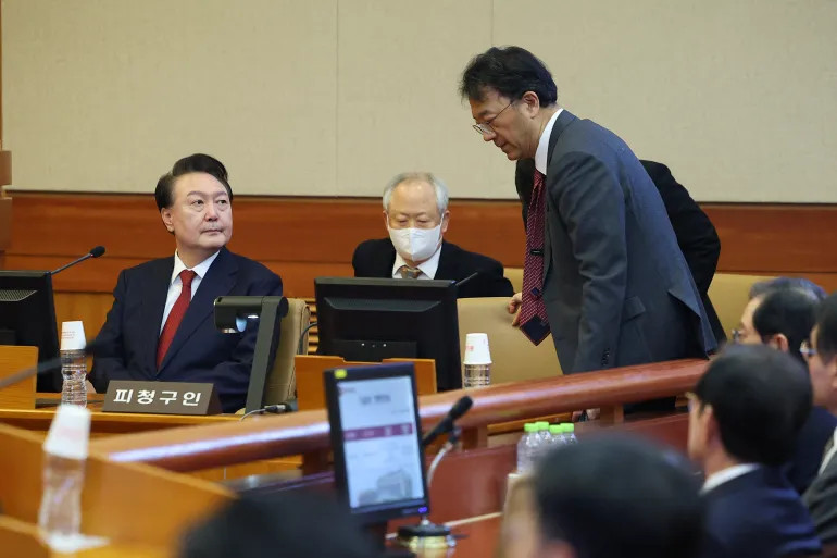 South Korea's impeached President Yoon Suk-yeol attends his impeachment trial at the Constitutional Court in Seoul on January 21, 2025 [Kim Hong-Ji/Pool via AFP]